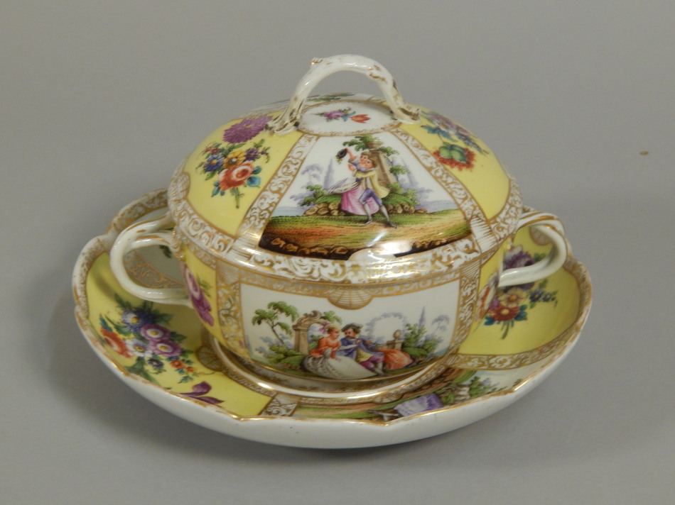 Appraisal: A Dresden porcelain two handled bowl cover and stand painted