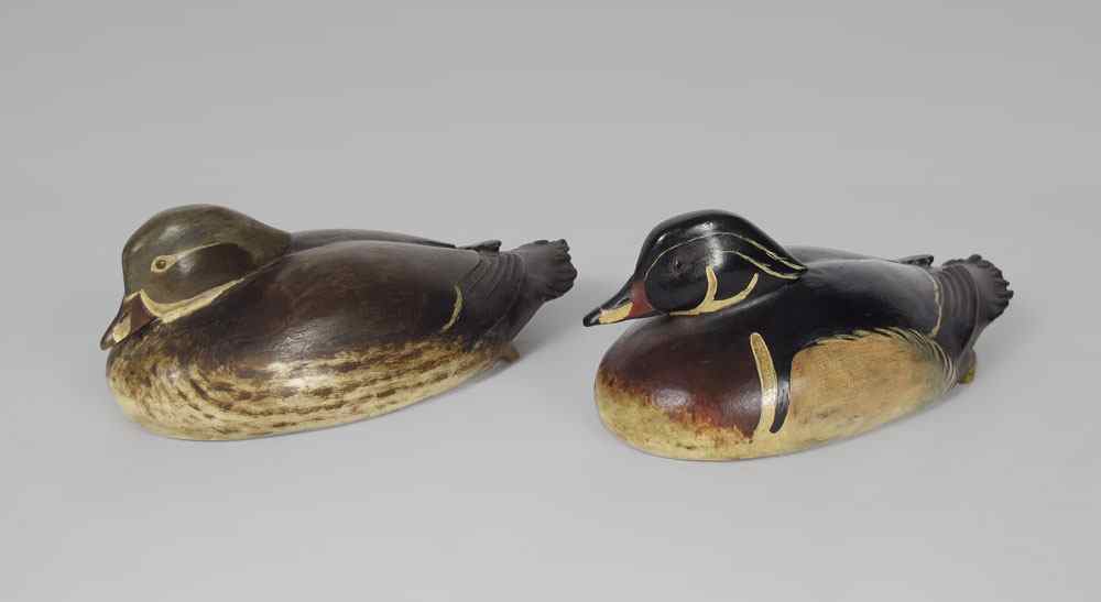 Appraisal: EXCEPTIONAL PAIR OF MINIATURE DUCK DECOYS Male and female painted