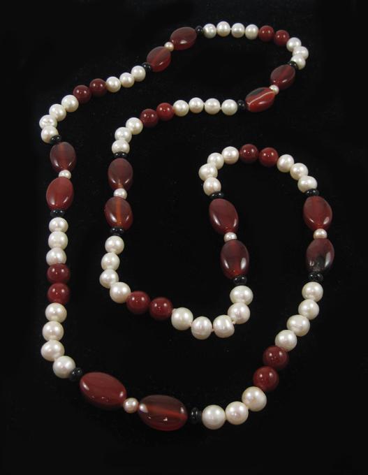 Appraisal: CARNELIAN BLACK AGATE AND WHITE PEARL NECKLACE length inches