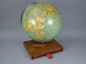 Appraisal: A Phillips terrestrial challenge globe mid th century mounted on