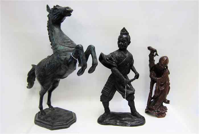 Appraisal: THREE COLLECTIBLE SCULPTURES bronze Samurai holding sword in both hands