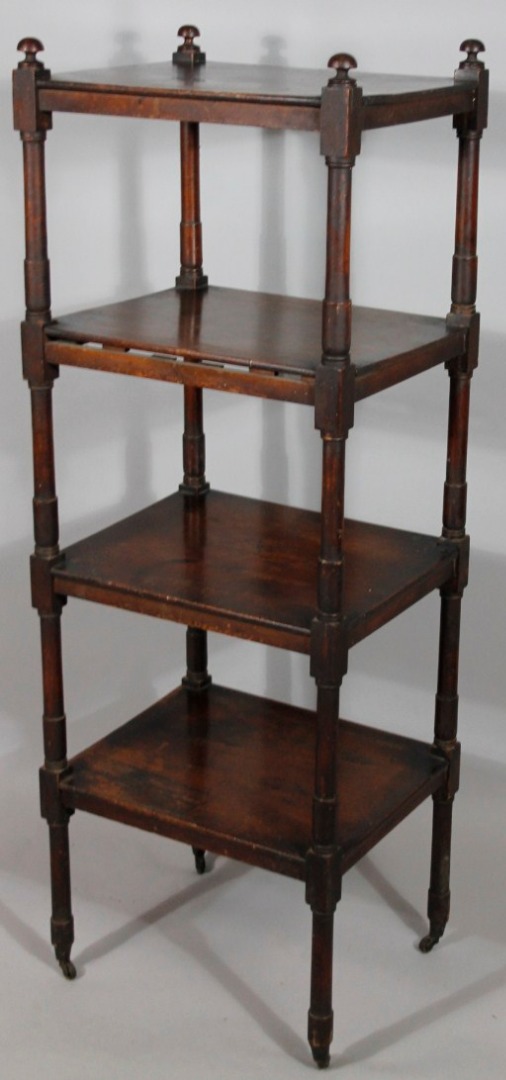 Appraisal: A thC mahogany whatnot with four rectangular shelves supported on