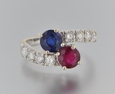 Appraisal: A Diamond Sapphire and Ruby Bypass Ring k white gold