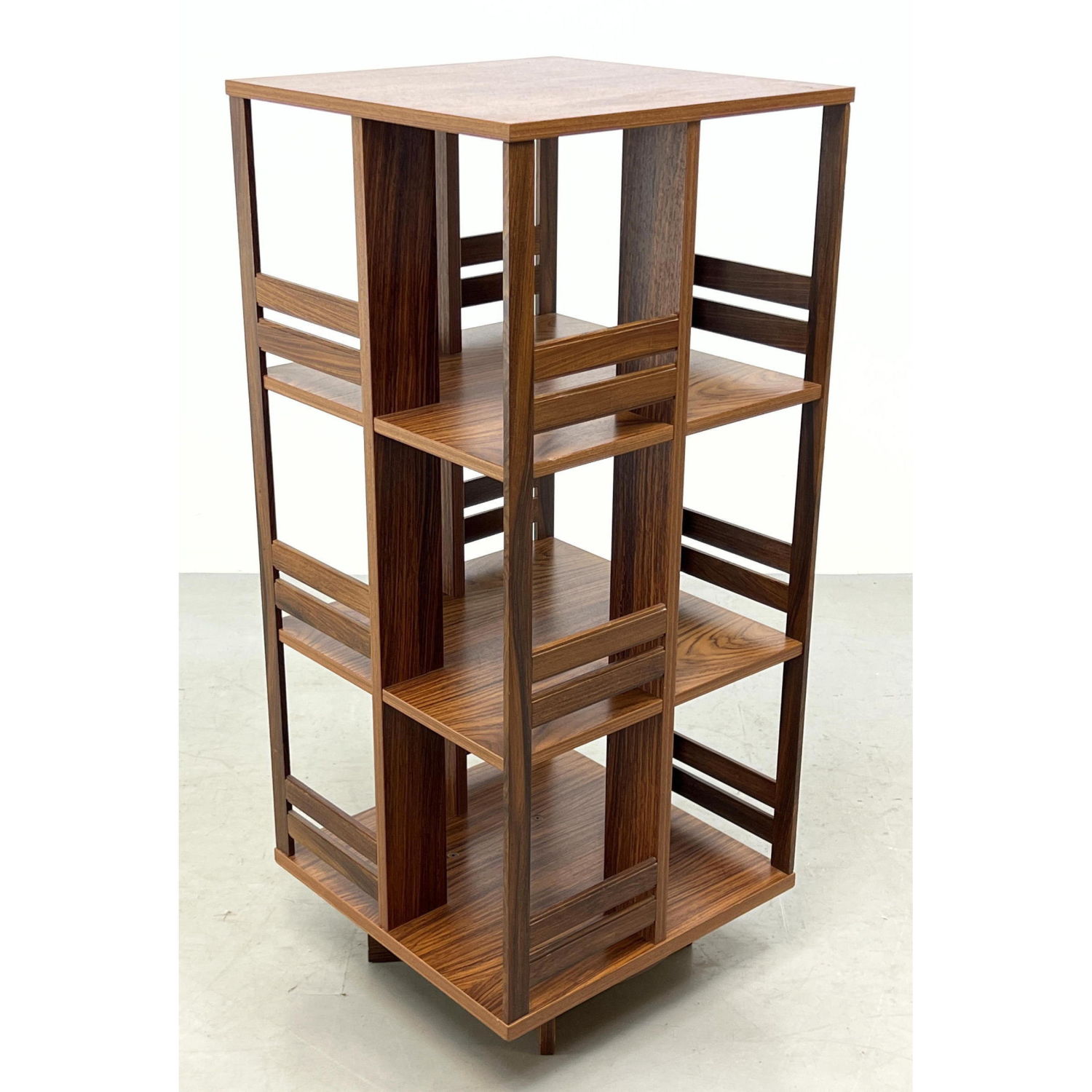 Appraisal: Rosewood Modernist Revolving Bookcase Shelves Unit Swivels for access Dimensions