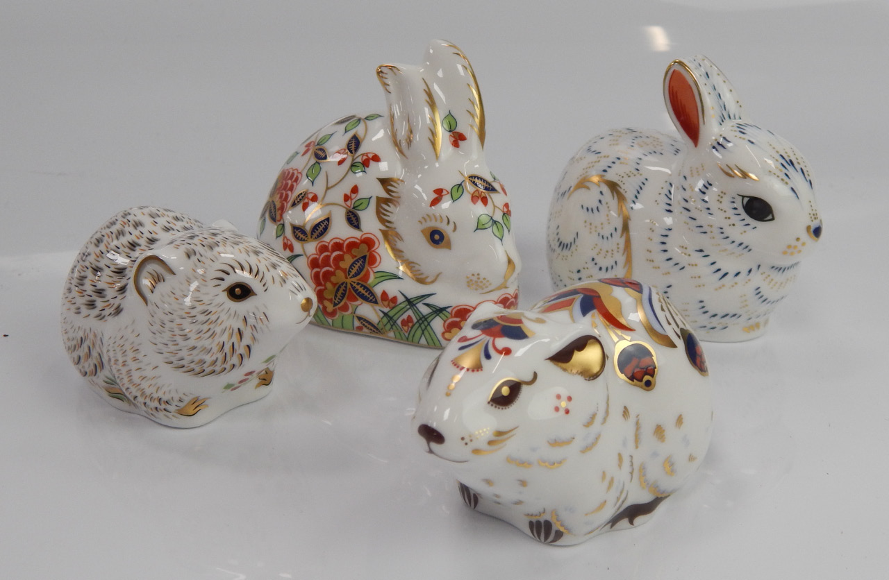 Appraisal: Two Royal Crown Derby paperweights of rabbits and two river