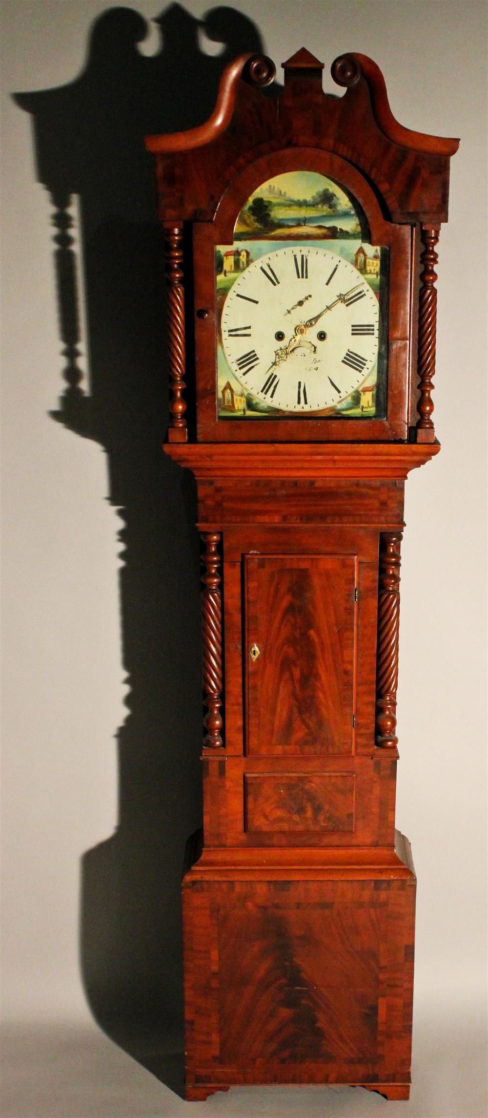 Appraisal: SCOTTISH MAHOGANY PAINTED DIAL LONGCASE CLOCK the break arch dial