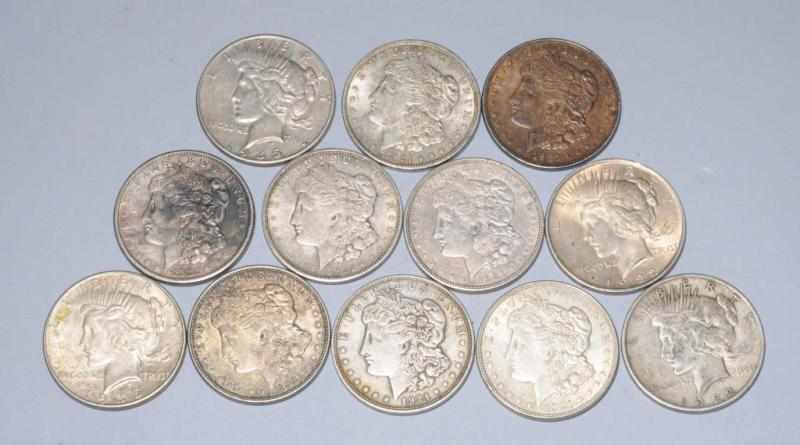 Appraisal: Lot of Silver Dollars Description Common dates Includes eight Morgan