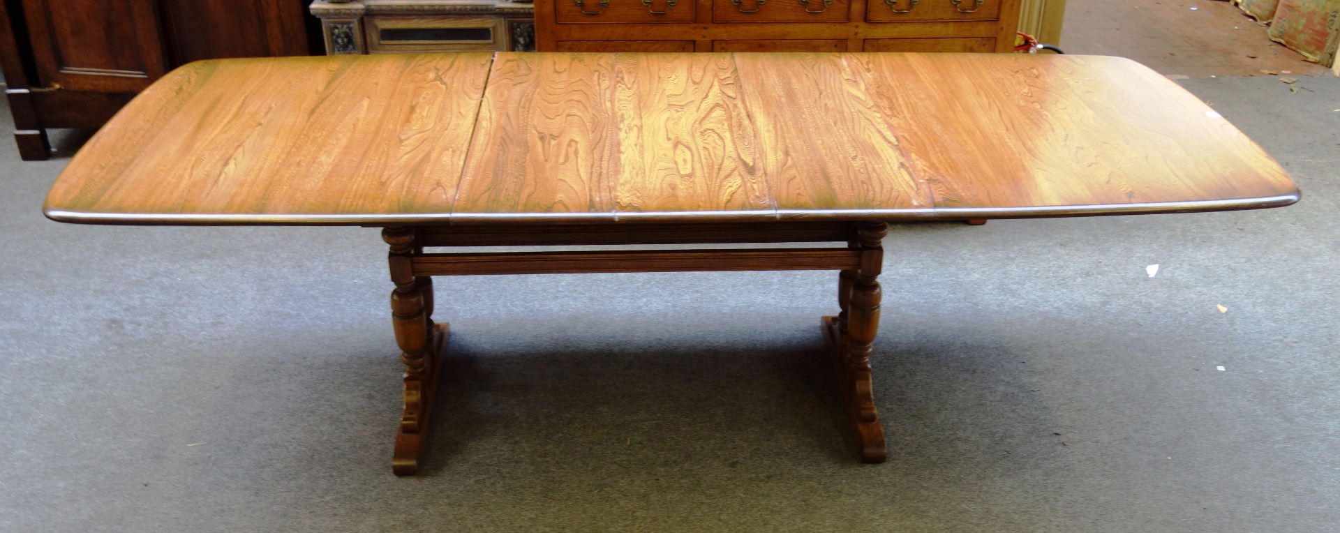 Appraisal: Ercol a th century oak extending dining table on double