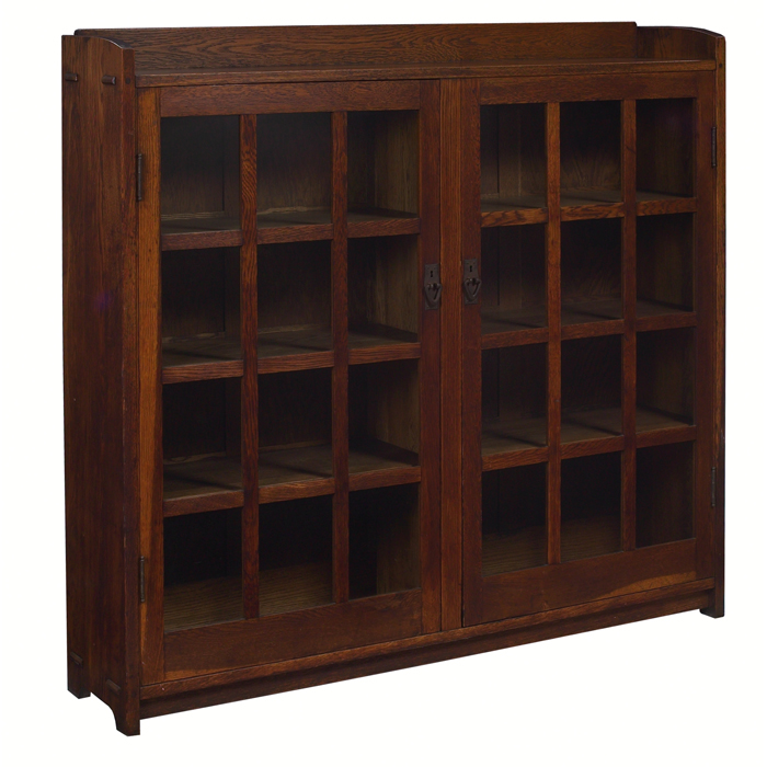 Appraisal: Good Gustav Stickley bookcase two-door form with twelve panes of