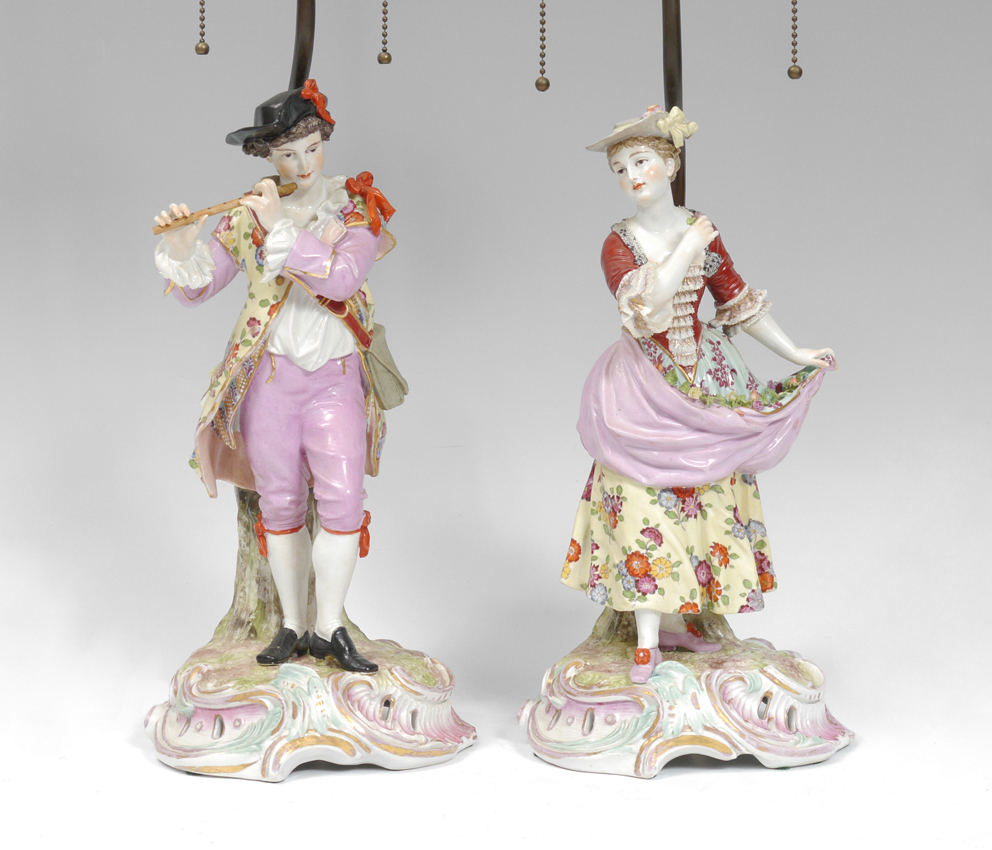 Appraisal: PAIR SITZENDORF FIGURAL LAMPS To include a man with fife