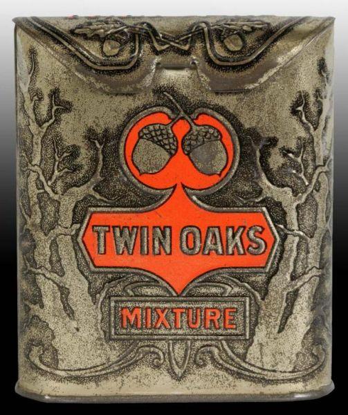 Appraisal: Embossed Twin Oaks Vertical Pocket Tobacco Tin Description Great example