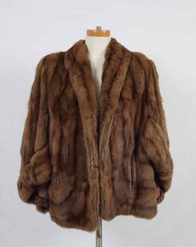 Appraisal: SWING STYLE MINK FUR CAPE WRAP JACKET With slit pockets