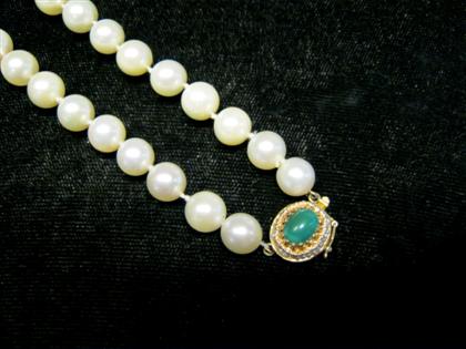 Appraisal: karat yellow gold and pearl necklaceGold clasp accented by petite