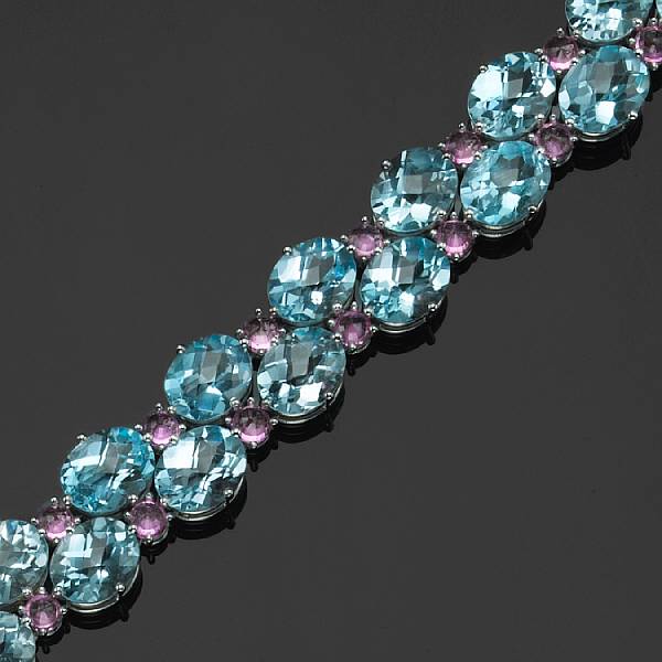 Appraisal: A blue topaz pink sapphire and k white gold bracelet