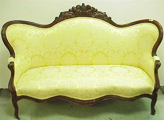 Appraisal: Victorian sofa th C shaped crest with fruit and scroll