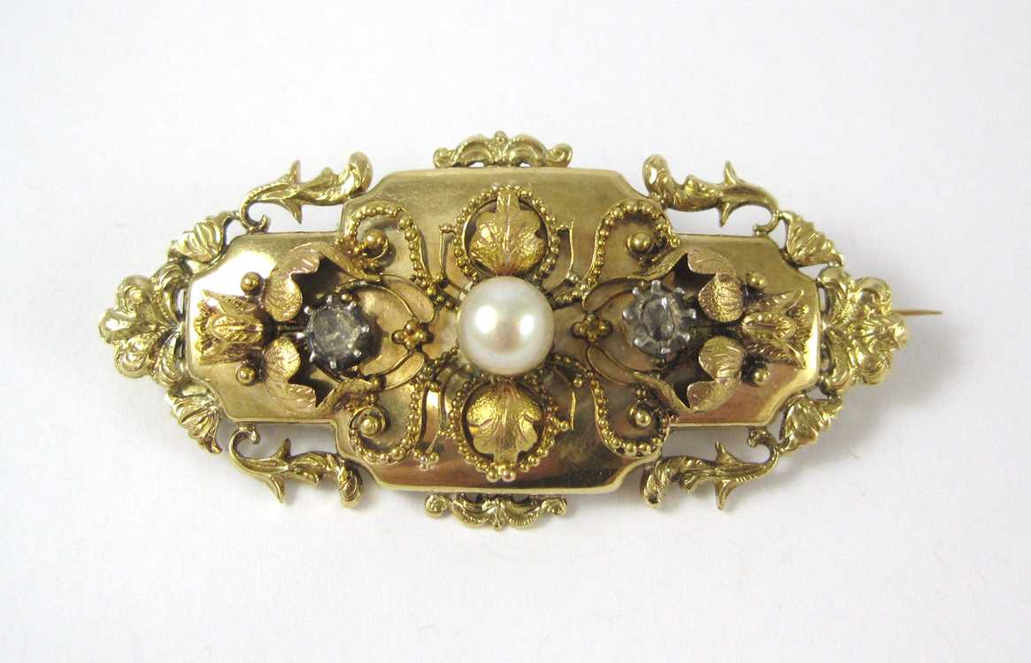 Appraisal: PEARL DIAMOND AND FOURTEEN KARAT GOLD BROOCH set with two