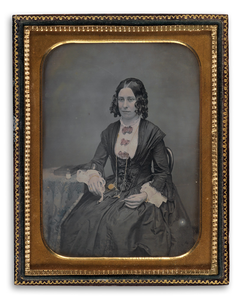 Appraisal: LEISURE Hand-tinted half-plate daguerreotype of a woman with lace-making or