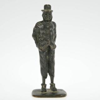 Appraisal: Manner of Honore Daumier Standing man adjusting his pants bronze