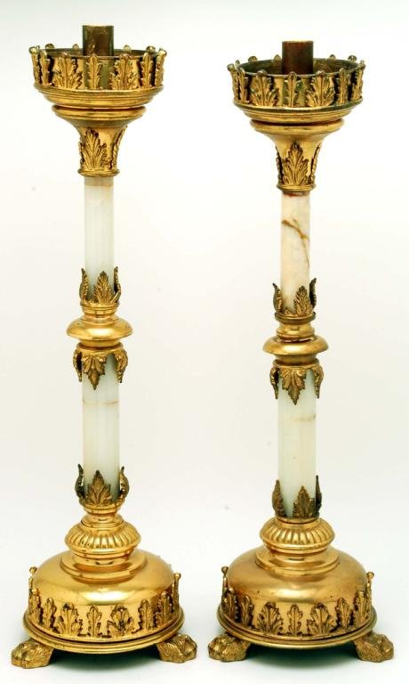 Appraisal: A pair of brass and onyx ecclesiastical candlesticks White onxy