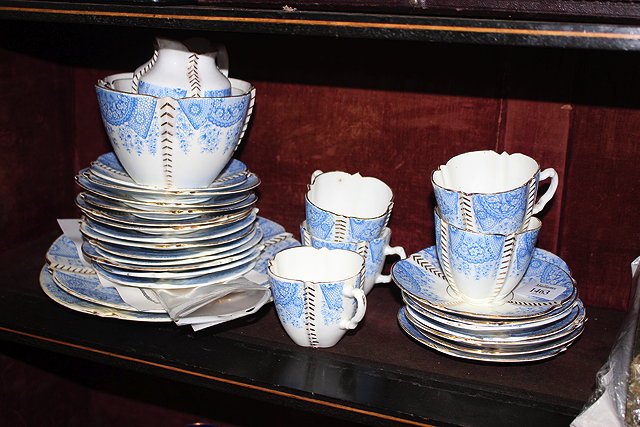 Appraisal: A FIVE PIECE BLUE AND WHITE TRESSA PRINTED AND GILT