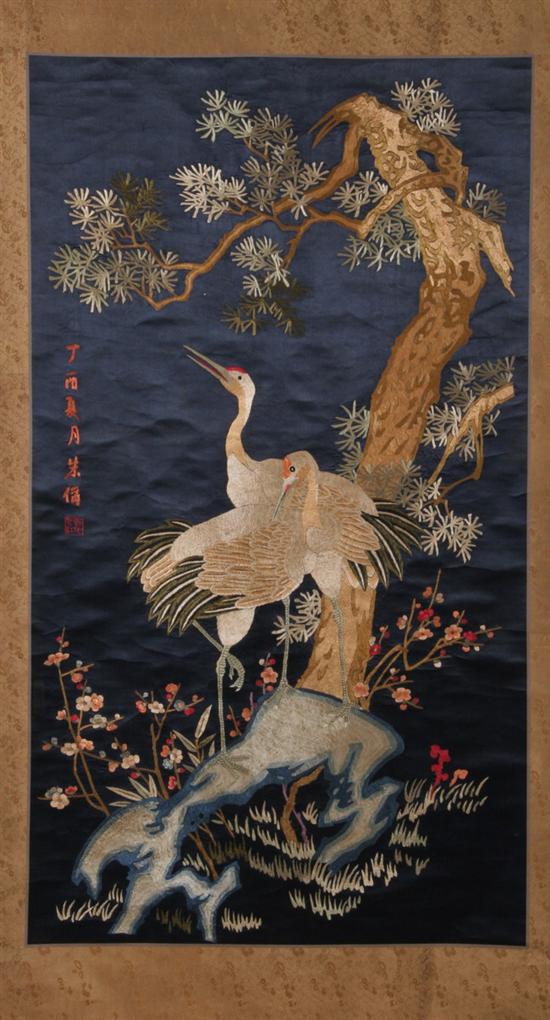 Appraisal: CHINESE EMBROIDERED DARK BLUE SILK PANEL th century Worked in