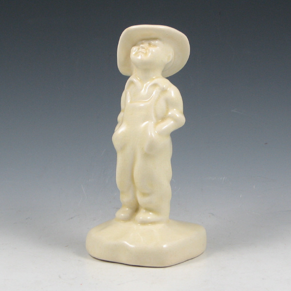 Appraisal: Rare Cowan Overall Boy figurine in ivory gloss glaze Unmarked