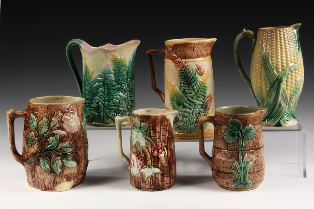 Appraisal: MAJOLICA PITCHERS - Including Stag Pitcher Corn Pitcher Apple Blossom