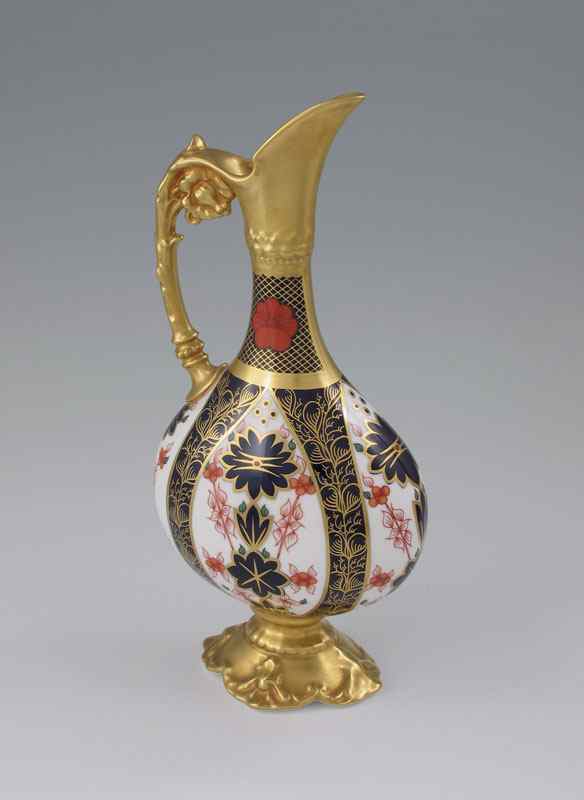 Appraisal: ROYAL CROWN DERBY OLD IMARI EWER Richly gilt handle spout