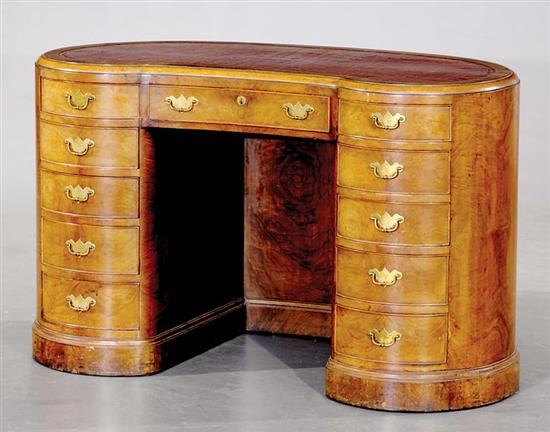 Appraisal: Edwardian walnut and burl kidney desk early th century shaped