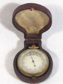 Appraisal: A brass pocket barometer in original red Morocco case circa