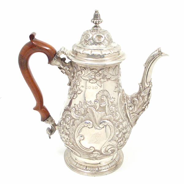 Appraisal: A George IV silver coffee pot with wooden handleGeorge King