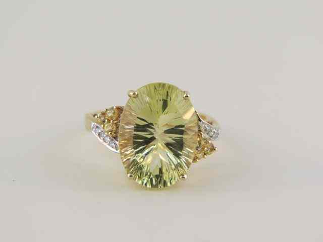 Appraisal: Lemon Topaz Diamond Ring carat radiant cut gem with side