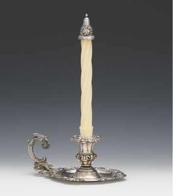 Appraisal: A Silver Chamberstick Circular foliate and shell relief decorated base