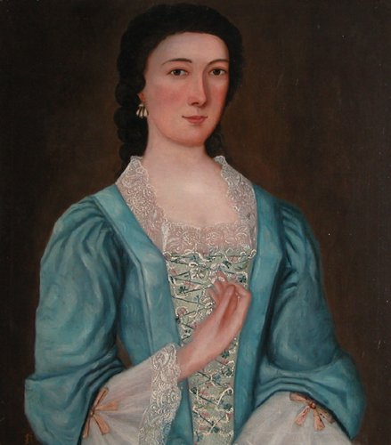 Appraisal: A woman wearing a beautiful colonial period dress holding her