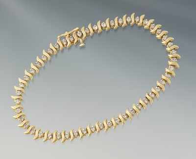 Appraisal: A Ladies' Tennis Diamond Bracelet k yellow gold bracelet set