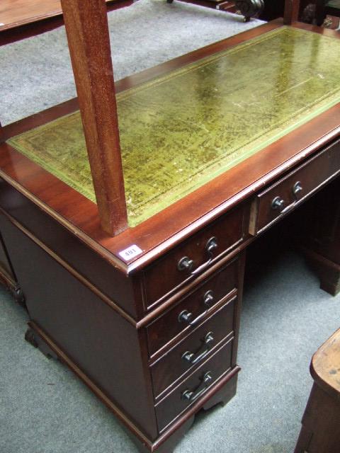 Appraisal: A George III style mahogany pedestal desk the gilt tooled