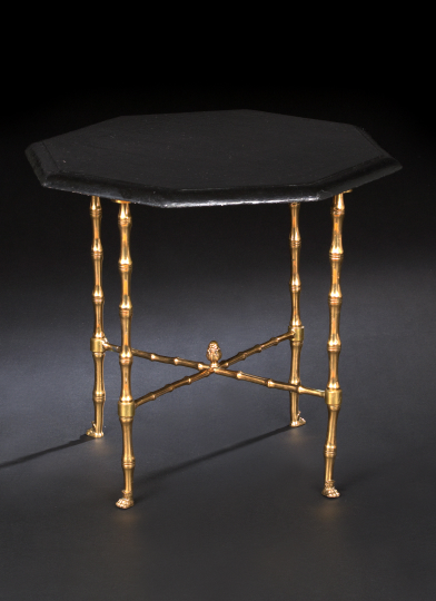 Appraisal: Empire-Style Ebonized and Gilt-Metal Occasional Table the ebonized octagonal top