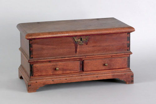 Appraisal: Pennsylvania miniature walnut blanket chest ca with two drawers and