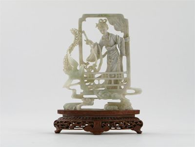 Appraisal: A Chinese jadeite carving of a young lady at a