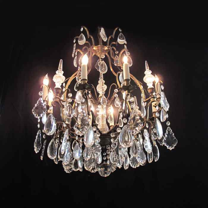 Appraisal: LIGHT CRYSTAL BRASS CHANDELIER arms with lights arms have glass