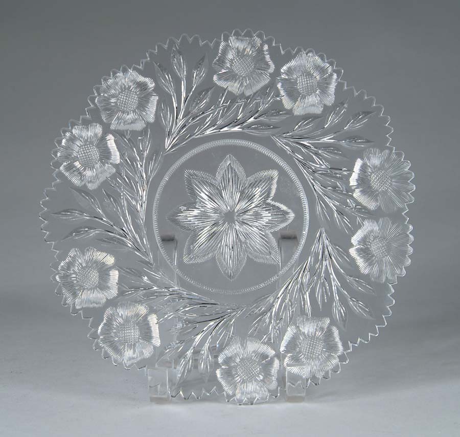 Appraisal: CUT GLASS PLATE Plate cut with flower blossoms and leaves