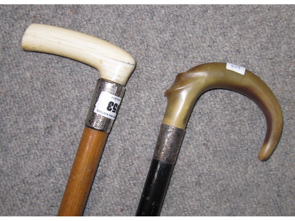 Appraisal: Lot comprising ivory and bone handled walking sticks