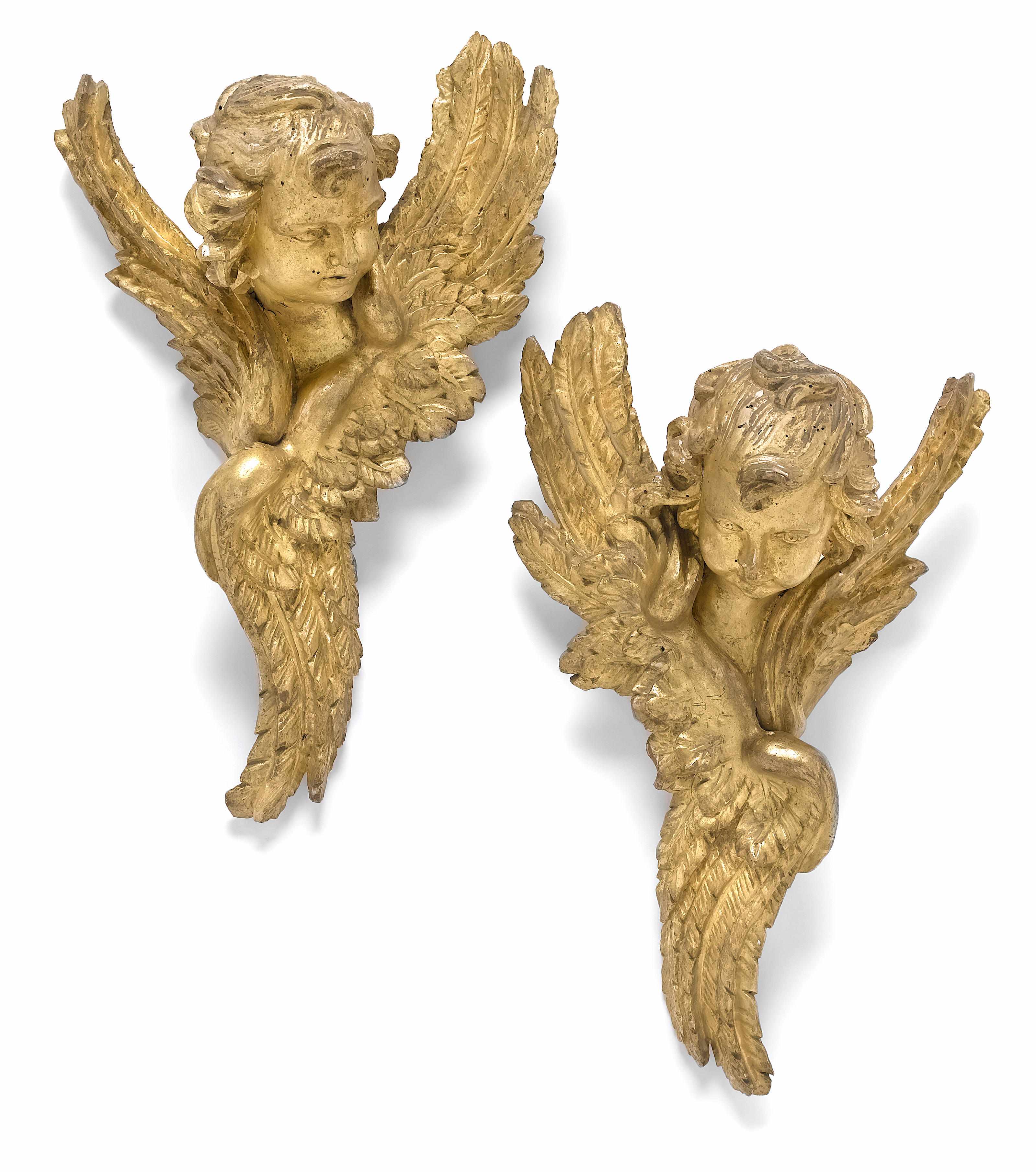 Appraisal: A pair of Continental Baroque giltwood amorini th century with