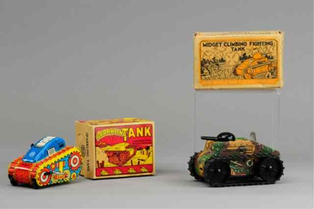 Appraisal: LOT OF TWO MARX TANKS Boxed examples lithographed tin includes