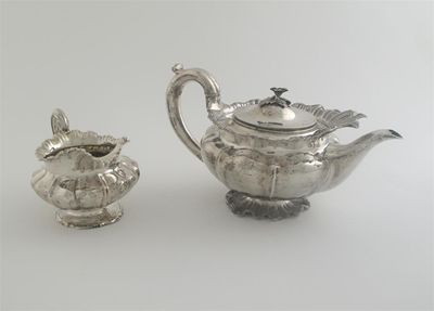 Appraisal: A William IV teapot with a shaped and matted foot