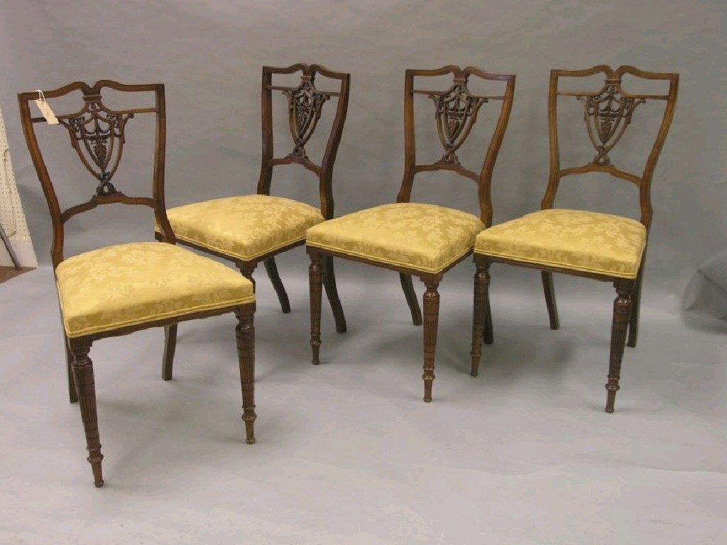 Appraisal: A set of four late Victorian walnut drawing room chairs