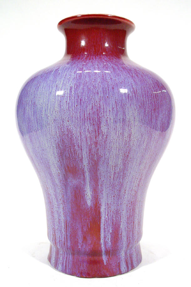 Appraisal: Large Chinese flambe glazed vase decorated with a purple and