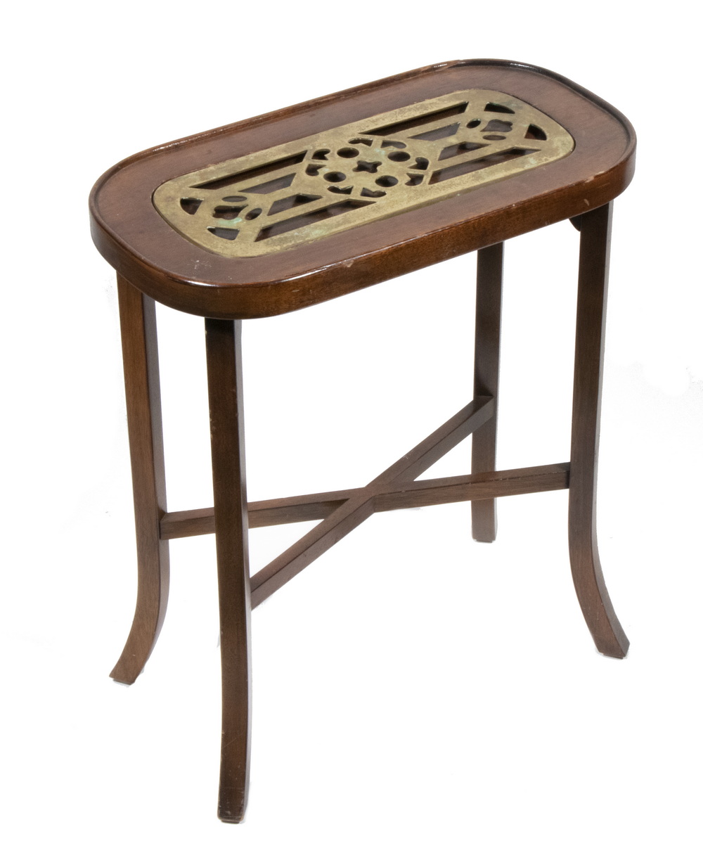 Appraisal: DECORATIVE TABLE WITH BRASS INSERT Oval Mahogany Side Table with