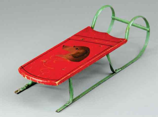 Appraisal: MINIATURE PAINTED SLED Wood body painted in red with bust