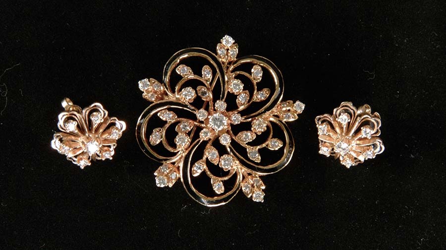 Appraisal: GOLD DIAMOND BROOCH EARRINGS Extremely fine k yellow gold set